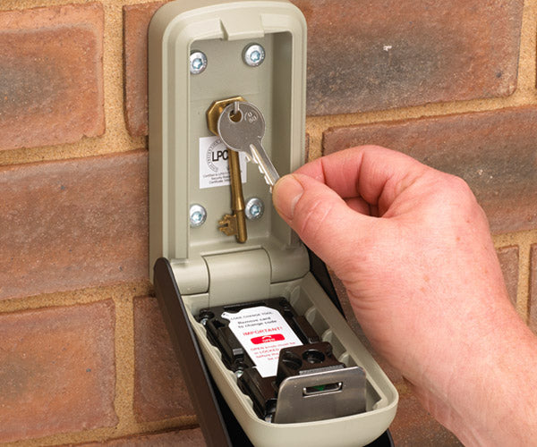 Key safe opened showing spare keys