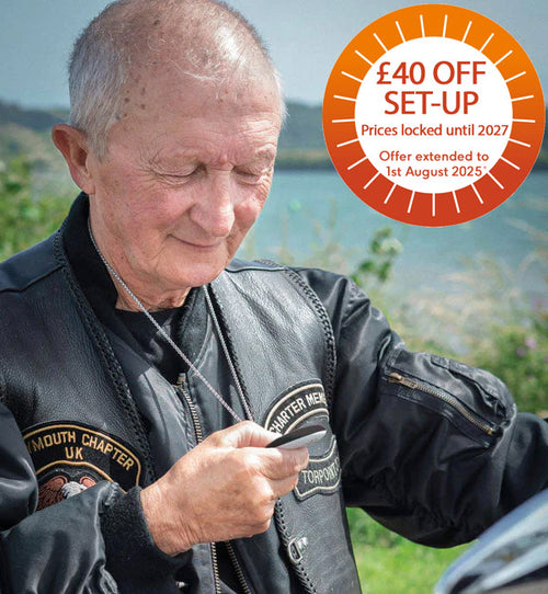 Elderly man with taking care anywhere alarm