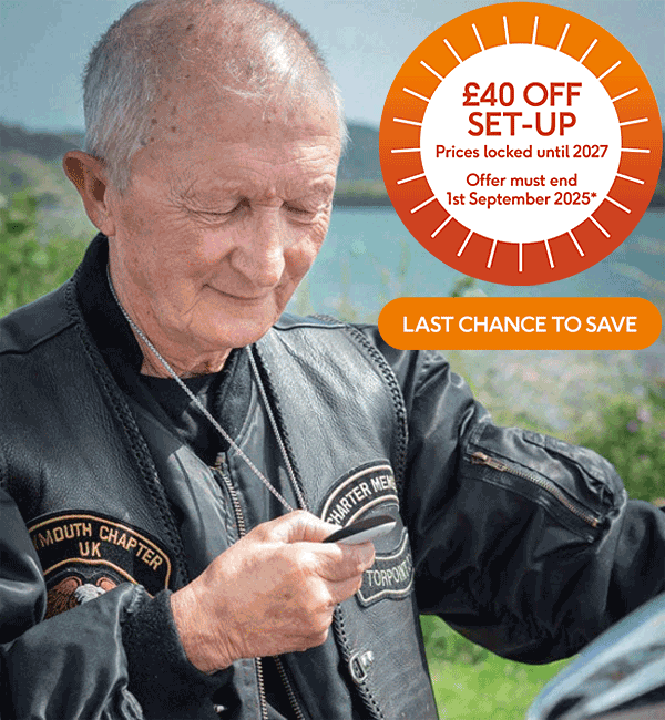 Older man with Taking Care Anywhere pendant