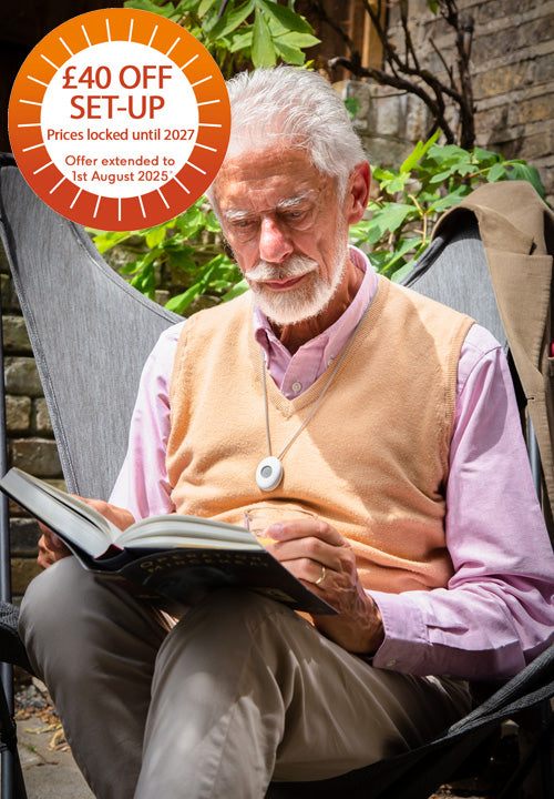 Man wearing digital personal alarm